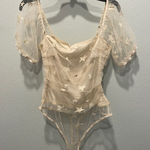 cream star bodysuit
